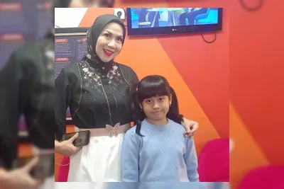 Vania Athabina Raih Medali Emas Festival Menyanyi Solo