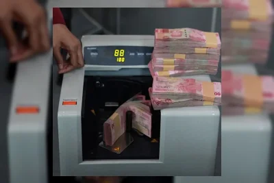 Rupiah Tembus Rp18.074 per Dolar AS, Ekonom Ingatkan Risiko Berantai