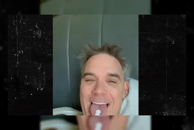 Robbie Williams Klarifikasi Benda Putih di Mikrofon Saat Siaran Piala Dunia